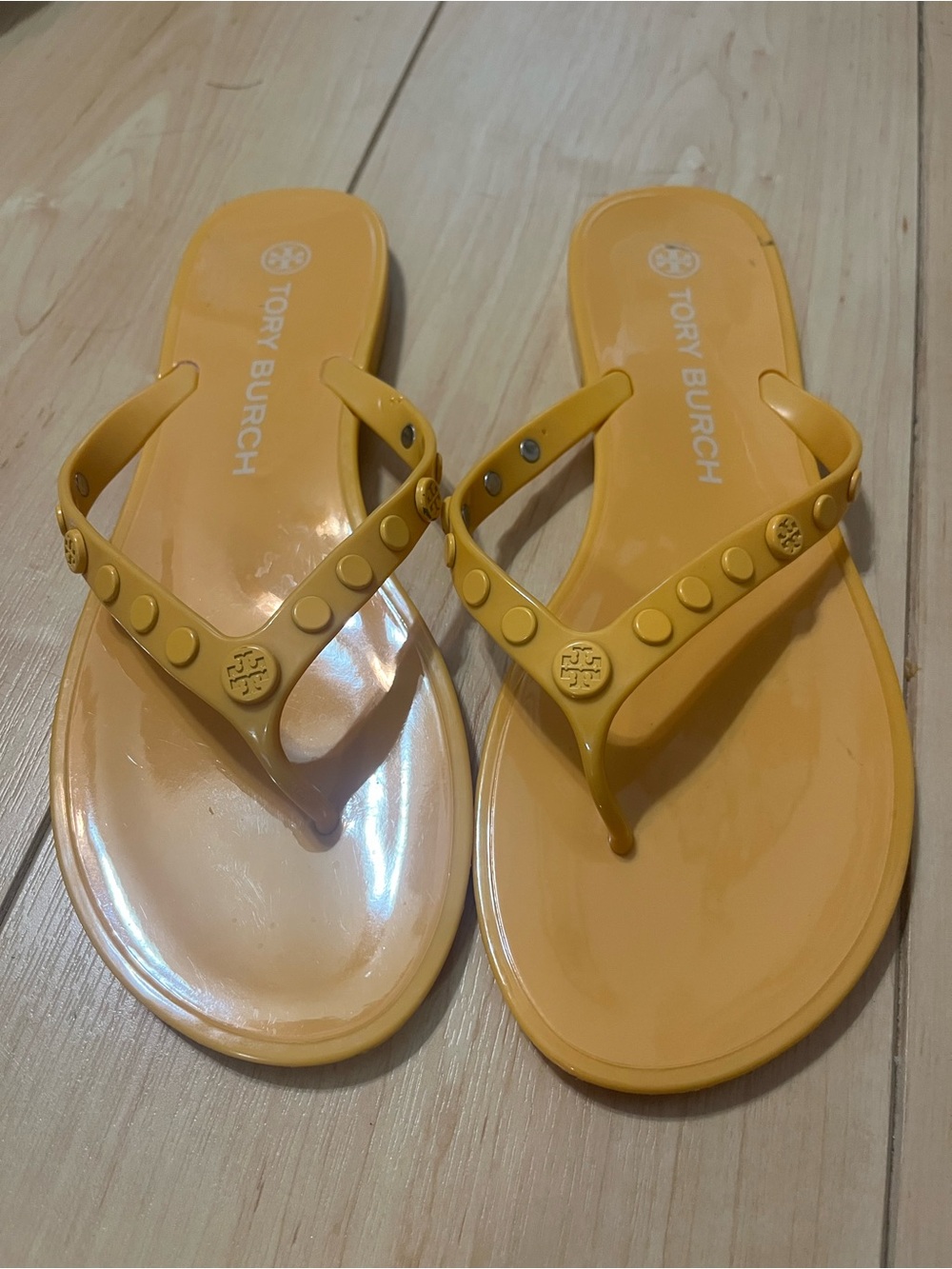 Tory Burch Studded Jelly Thong Sandal in “Sunburst” color